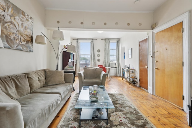 914 Washington St, Hoboken, NJ 07030 - living area with light wood-style flooring, cooling unit, and crown molding
