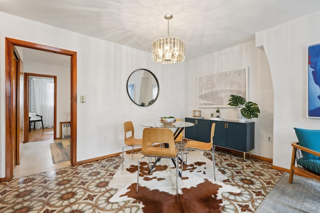 914 Washington St, Hoboken, NJ 07030 - dining room featuring radiator heating unit and a chandelier