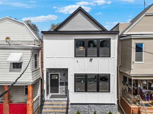 view of front of home featuring board and batten siding and entry steps