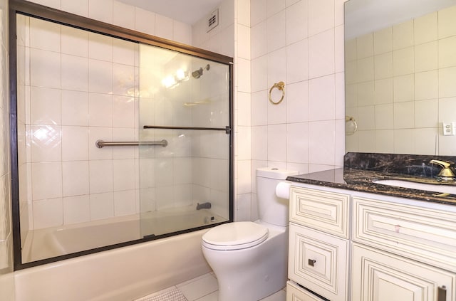 1 Claridge Dr Unit 310, Verona, NJ 07044 - full bath with tile walls, vanity, enclosed tub / shower combo, and tile patterned flooring