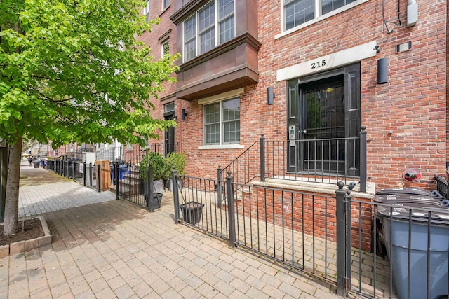 215 Monroe St Unit 3, Hoboken, NJ 07030 - property entrance with a gate and brick siding