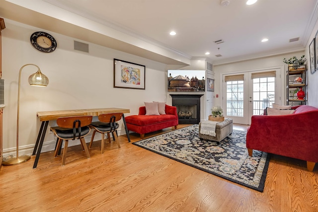 215 Monroe St Unit 3, Hoboken, NJ 07030 - living area featuring ornamental molding, wood finished floors, a fireplace, and recessed lighting