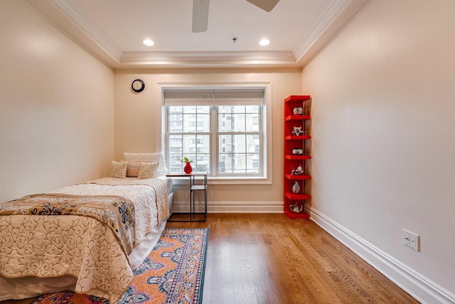 215 Monroe St Unit 3, Hoboken, NJ 07030 - bedroom featuring ornamental molding, wood finished floors, a tray ceiling, and a ceiling fan