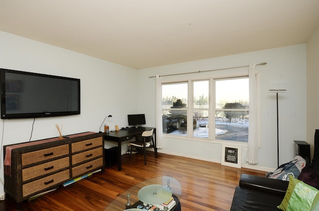 office space with hardwood / wood-style floors