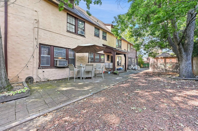 back of house featuring a patio area