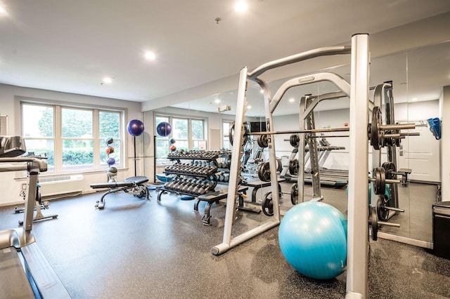 workout area with recessed lighting and a wall mounted air conditioner