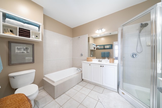 full bathroom with toilet, a shower stall, tile patterned flooring, a bath, and vanity