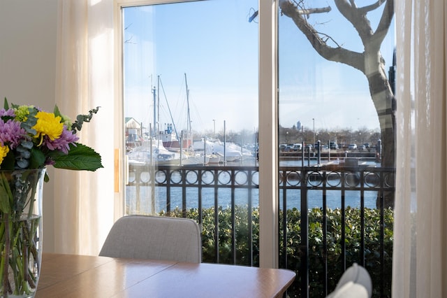 balcony featuring a water view