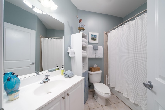 full bath with tile patterned flooring, curtained shower, toilet, and vanity