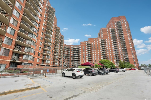 340 Harmon Cove Tower 340, Secaucus, NJ 07094 - view of apartment building / complex featuring uncovered parking