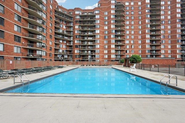 340 Harmon Cove Tower 340, Secaucus, NJ 07094 - community pool featuring a patio