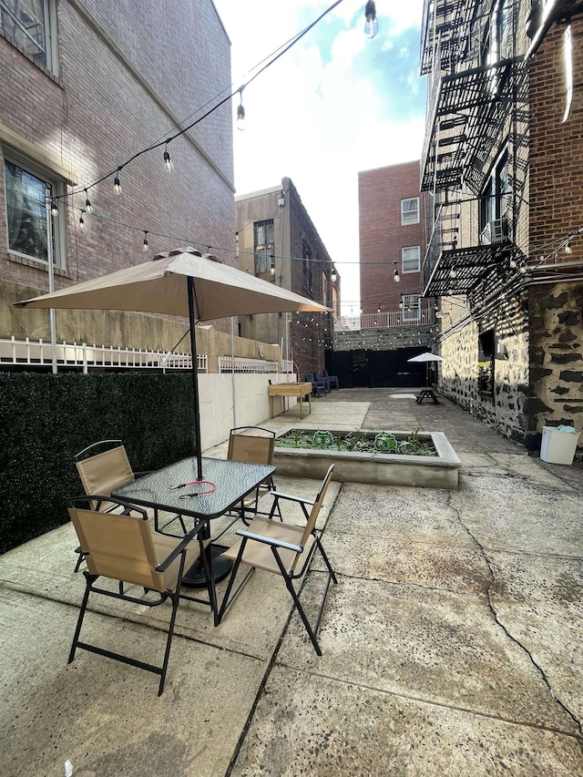 315 56th St Unit D4, West New York, NJ 07093 - view of patio featuring outdoor dining area