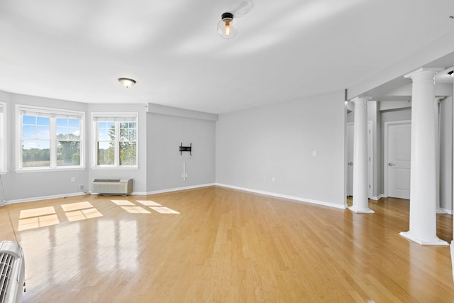 unfurnished living room with light wood-type flooring