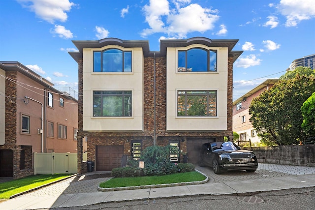 view of front of property with a garage