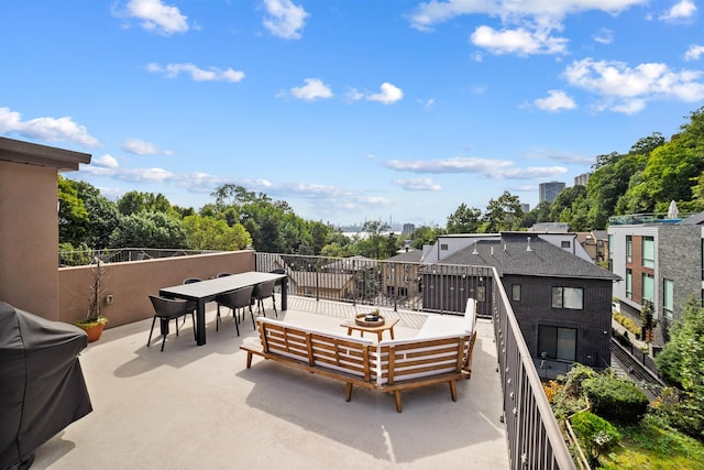 view of patio with a balcony, outdoor lounge area, and grilling area