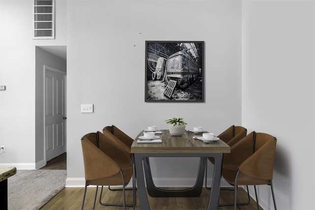 139 Morris St Unit 7, Jersey City, NJ 07302 - dining area featuring baseboards, wood finished floors, and an office area