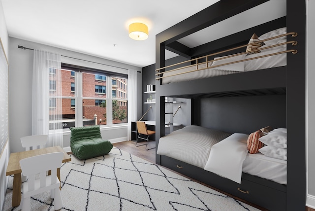15 Warren St Unit 102, Jersey City, NJ 07032 - bedroom featuring wood finished floors and baseboards
