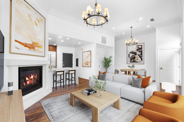 15 Warren St Unit 102, Jersey City, NJ 07032 - living area with a chandelier, recessed lighting, crown molding, dark wood-style flooring, and a glass covered fireplace