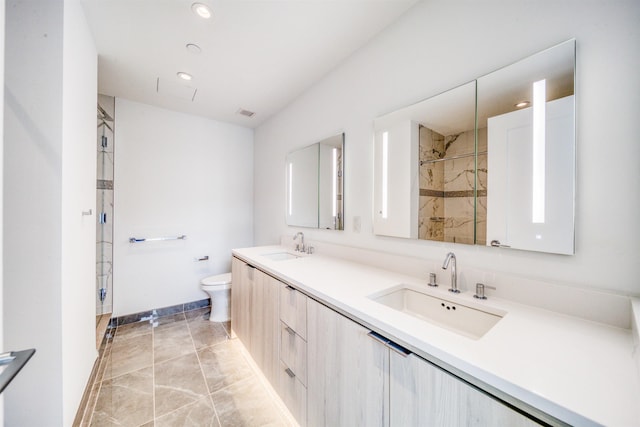 800 Ave At Port Imperial Unit 323, Weehawken, NJ 07086 - bathroom with double vanity, a shower stall, recessed lighting, and marble finish flooring