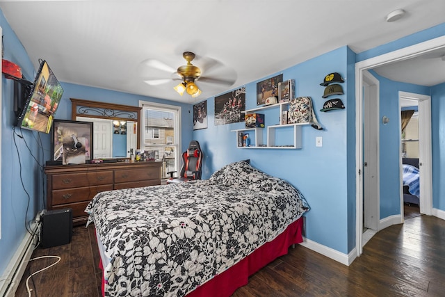 1501 41st St, North Bergen, NJ 07047 - bedroom featuring wood finished floors, baseboard heating, and ceiling fan