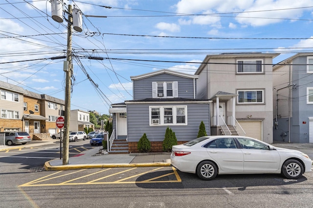 1501 41st St, North Bergen, NJ 07047 - view of property featuring uncovered parking