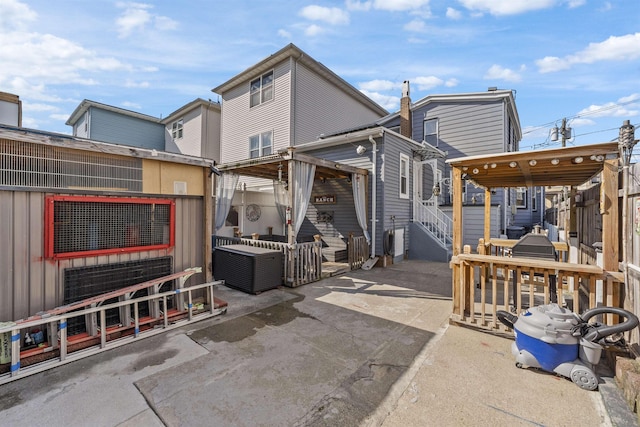 1501 41st St, North Bergen, NJ 07047 - rear view of house with a patio