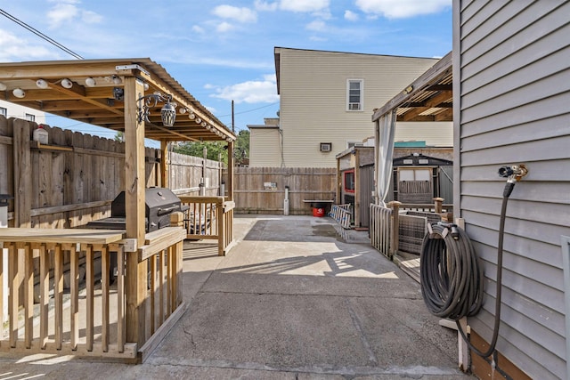 1501 41st St, North Bergen, NJ 07047 - fenced backyard featuring a shed and a patio area