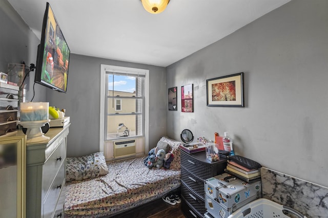 1501 41st St, North Bergen, NJ 07047 - bedroom with wood finished floors and a wall mounted air conditioner