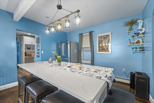 1501 41st St, North Bergen, NJ 07047 - dining room with a baseboard radiator, beamed ceiling, and dark wood finished floors