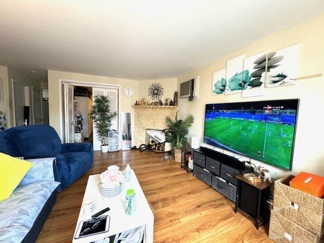 living area with wood finished floors
