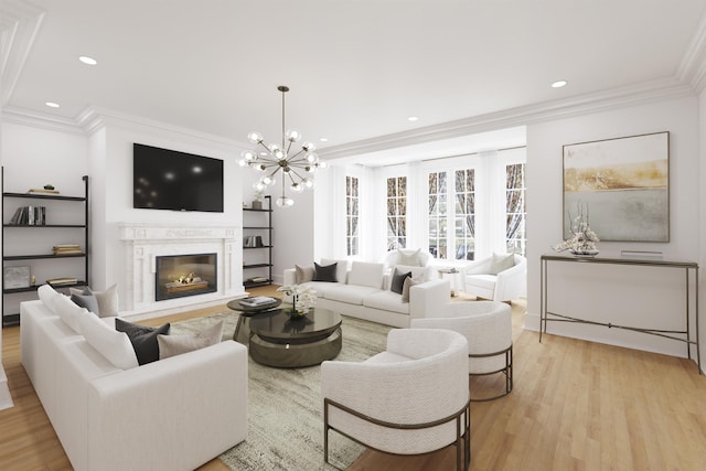 living room with a glass covered fireplace, crown molding, light wood finished floors, and recessed lighting