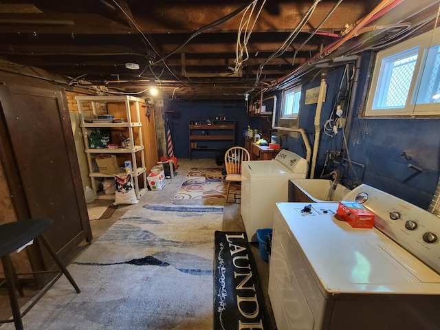 below grade area featuring washing machine and dryer