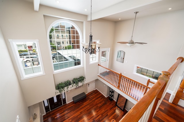 25 Poplar St, Jersey City, NJ 07307 - stairs with a towering ceiling, wood finished floors, a chandelier, recessed lighting, and a ceiling fan