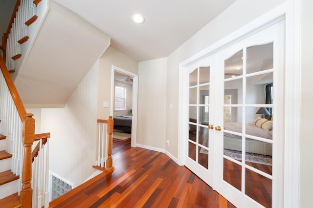 25 Poplar St, Jersey City, NJ 07307 - hallway with french doors, wood finished floors, stairway, and recessed lighting