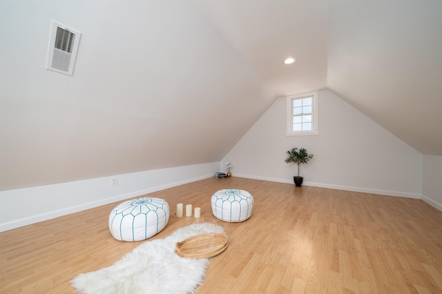 25 Poplar St, Jersey City, NJ 07307 - additional living space featuring wood finished floors and vaulted ceiling
