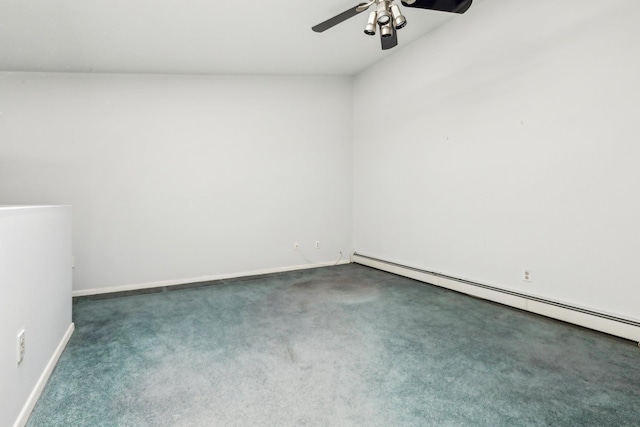 unfurnished room with baseboards, baseboard heating, a ceiling fan, and dark carpet