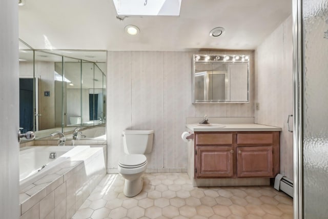bathroom featuring tile patterned flooring, toilet, a bath, a baseboard radiator, and a skylight