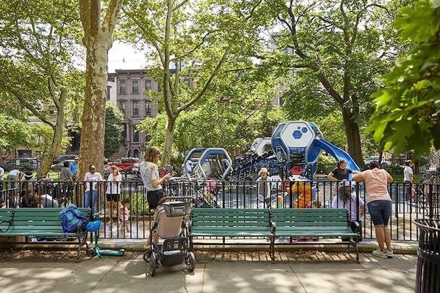 view of home's community with playground community