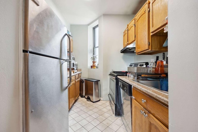 kitchen featuring light tile patterned floors, light countertops, under cabinet range hood, appliances with stainless steel finishes, and brown cabinets