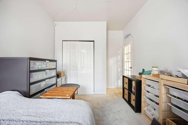 bedroom with a closet and carpet floors