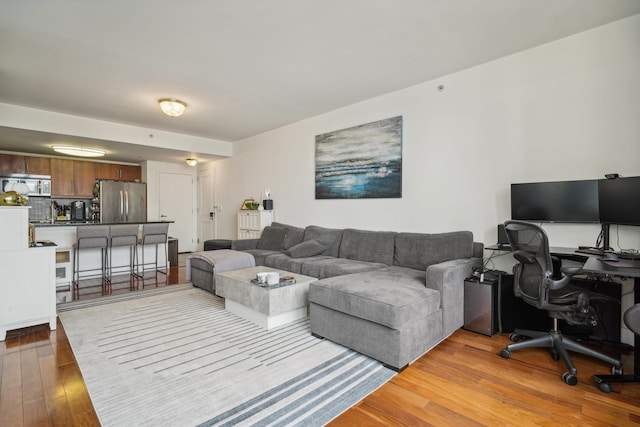 living room featuring wood-type flooring