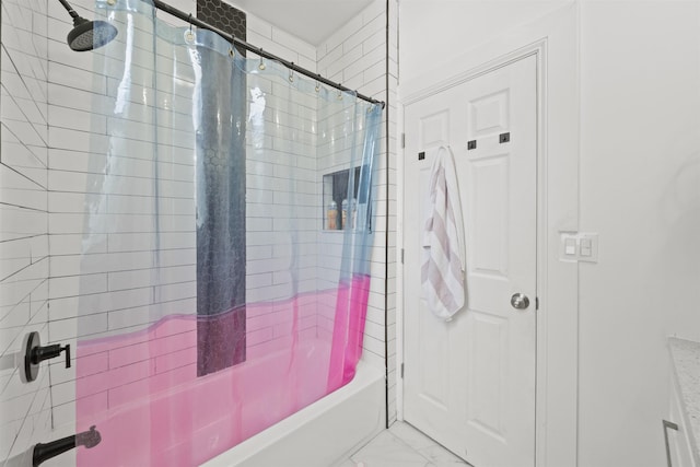 33 Duer Pl, Weehawken, NJ 07086 - full bath featuring shower / tub combo and marble look tile flooring