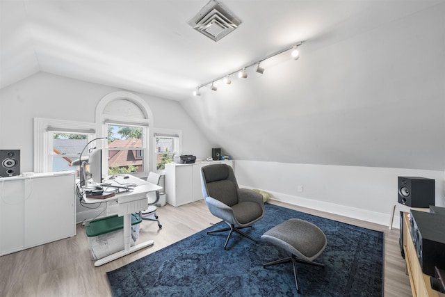 33 Duer Pl, Weehawken, NJ 07086 - office with vaulted ceiling, wood finished floors, and track lighting