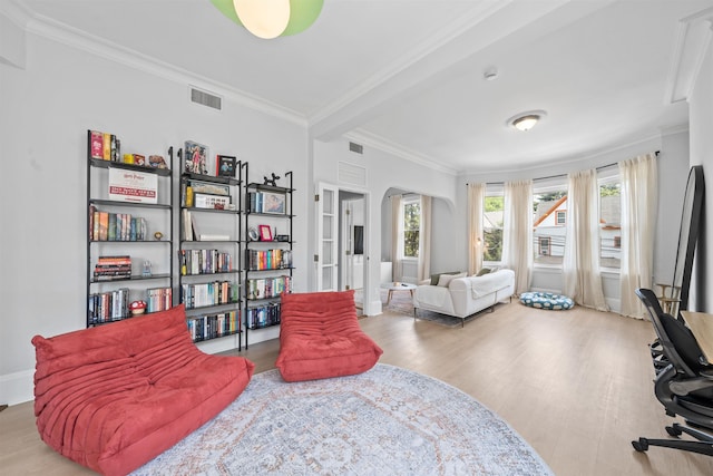 33 Duer Pl, Weehawken, NJ 07086 - sitting room featuring arched walkways, crown molding, and wood finished floors