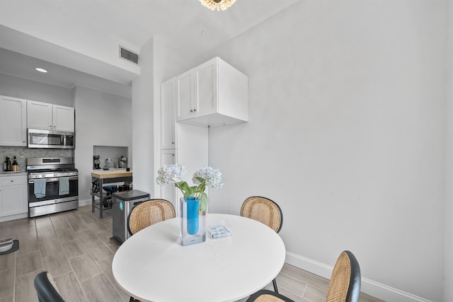 33 Duer Pl, Weehawken, NJ 07086 - dining room with recessed lighting and light wood-style floors