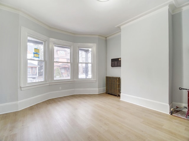 33 Duer Pl, Weehawken, NJ 07086 - unfurnished room featuring radiator, light wood-style flooring, and crown molding