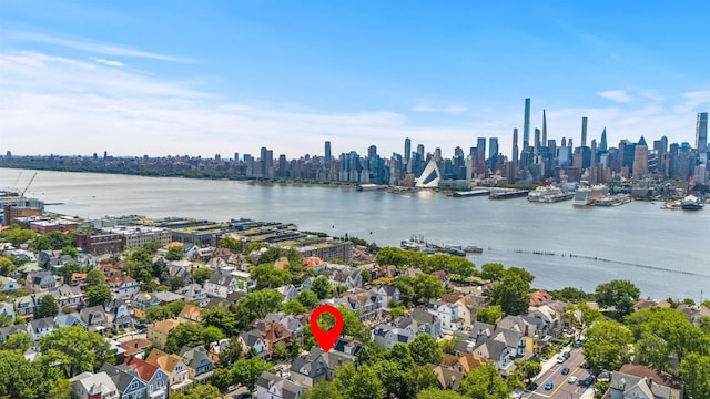 33 Duer Pl, Weehawken, NJ 07086 - aerial view of property and surrounding area with a nearby body of water and skyline