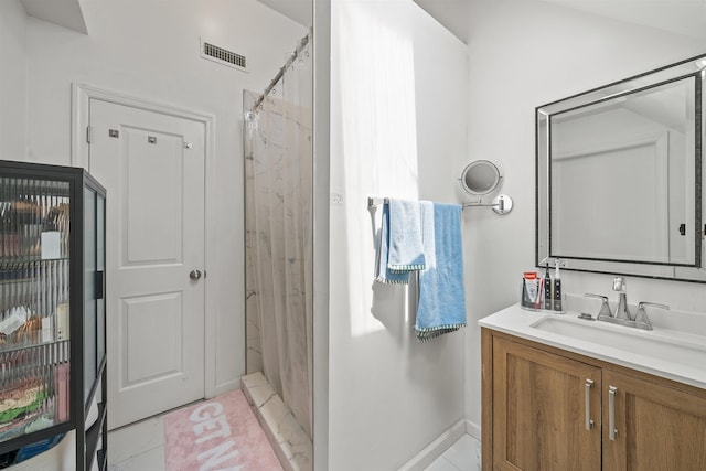 33 Duer Pl, Weehawken, NJ 07086 - bathroom with vanity, a shower with curtain, and tile patterned floors