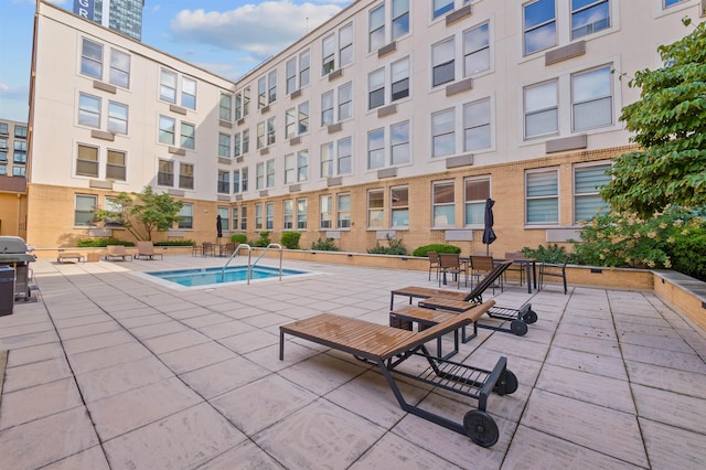 10 Regent St Unit 308, Jersey City, NJ 07302 - community pool with a grill and a patio