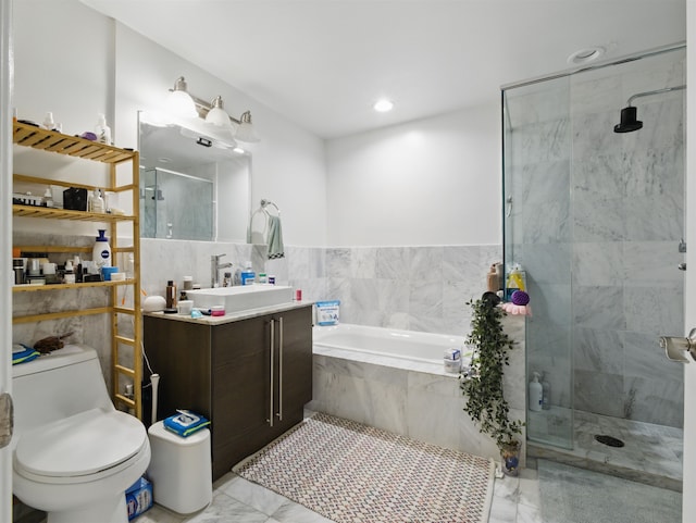 10 Regent St Unit 308, Jersey City, NJ 07302 - bathroom featuring marble finish flooring, vanity, a bath, tiled shower, and toilet
